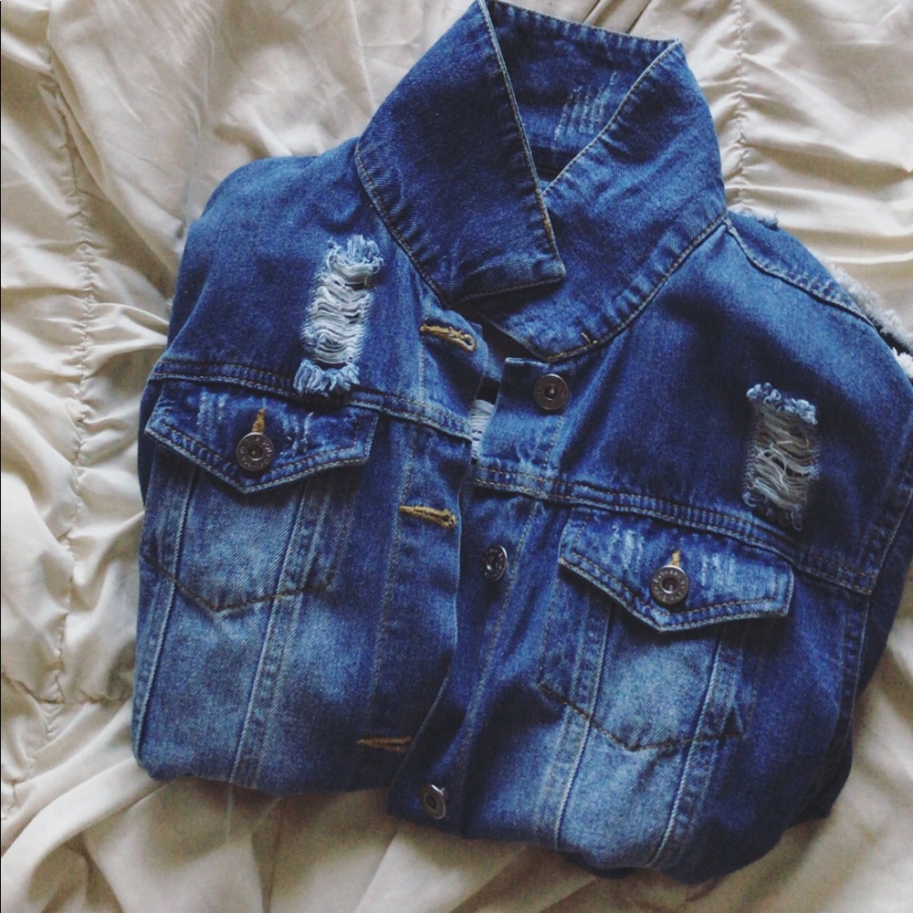 A distressed denim jacket